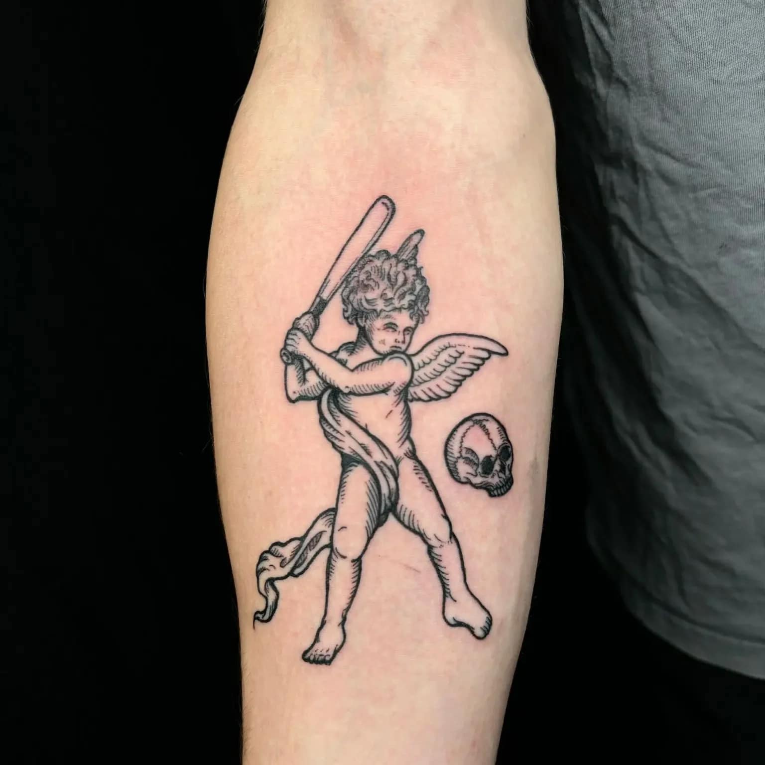 lukas-blackwork-cherub-angel-skull-tattoo